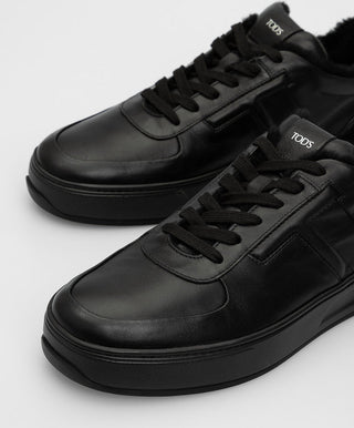TODS MENS Black leather sneakers with fur